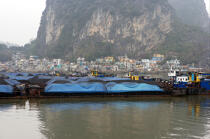 Extraction of coal in bay of Ha Long © Philip Plisson / Pêcheur d’Images / AA14136 - Photo Galleries - Ha Long Bay
