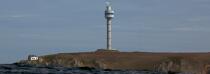 La pointe de Bac'haol et la tout radar du Stiff à Ouessant © Philip Plisson / Plisson La Trinité / AA24293 - Nos reportages photos - Maison