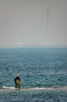 Fisherman in front of Gatteville lighthouse © Philip Plisson / Plisson La Trinité / AA29826 - Photo Galleries - Manche [The]