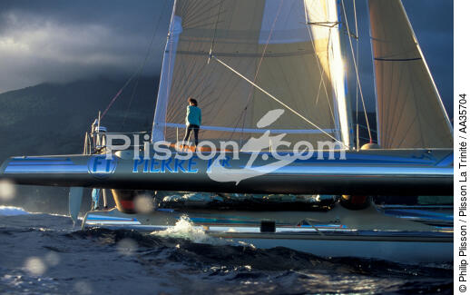 The arrival of the Route du Rhum 1990, Pointe à Pitre in Guadeloupe. [AT] - © Philip Plisson / Plisson La Trinité / AA35704 - Photo Galleries - Racing multihull